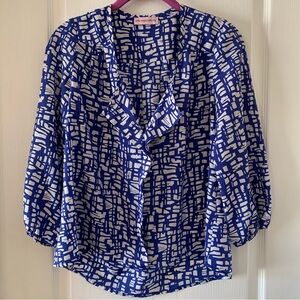 The Impeccable Pig blue and white geometric ruffle front V neck blouse
